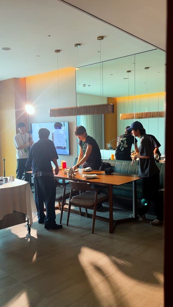 Person Edge crew filming in a restaurant